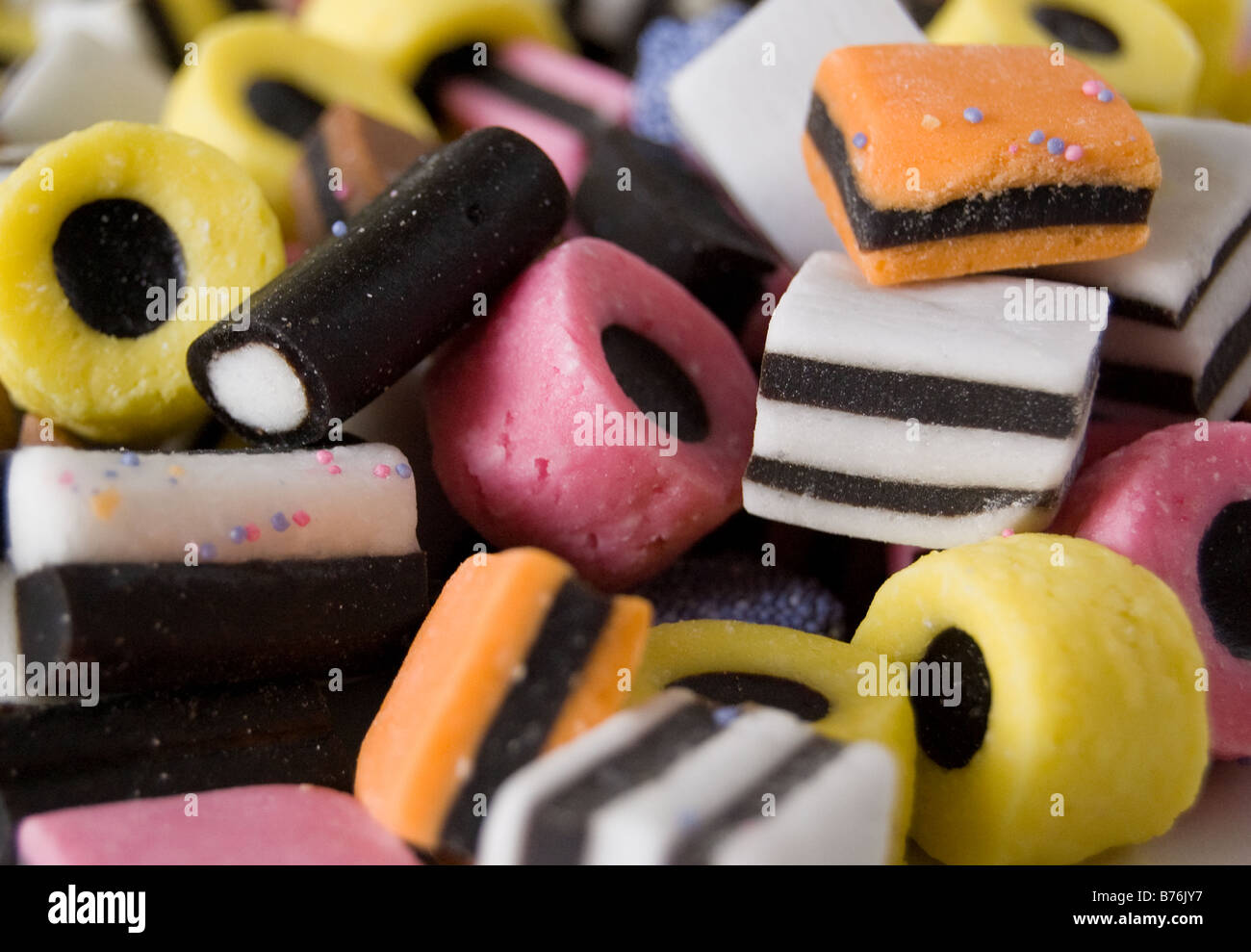 Brightly coloured licorice allsorts sweets Stock Photo Alamy