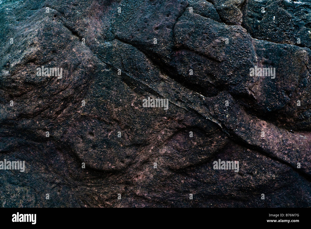 Close up of rock on beach Stock Photo