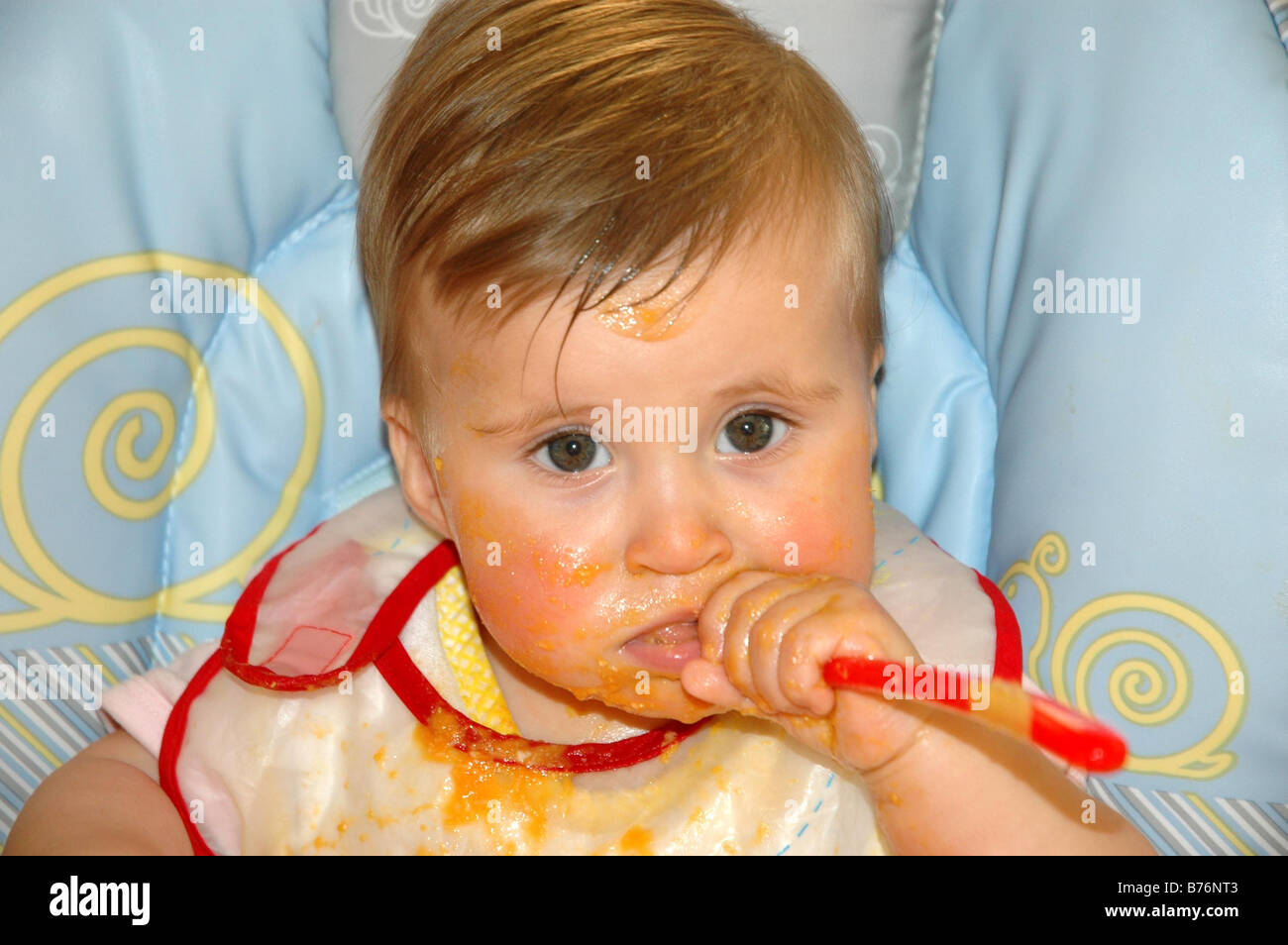 baby girl child intense look point finger Stock Photo