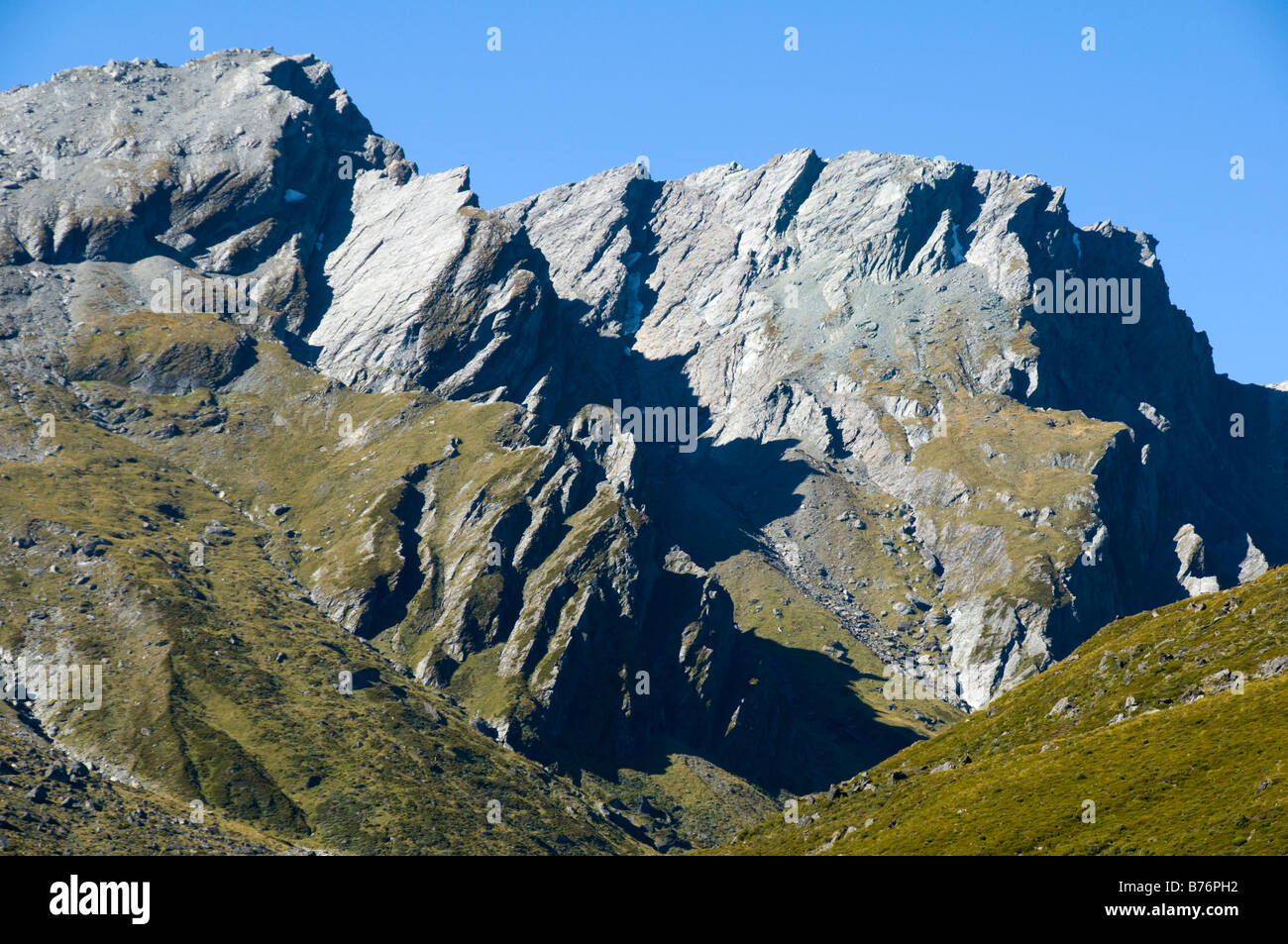 Cliffs and ridges on the Forbes Mountains, from the Shelter Rock Hut Rees valley, Rees Dart track, South Island, New Zealand Stock Photo