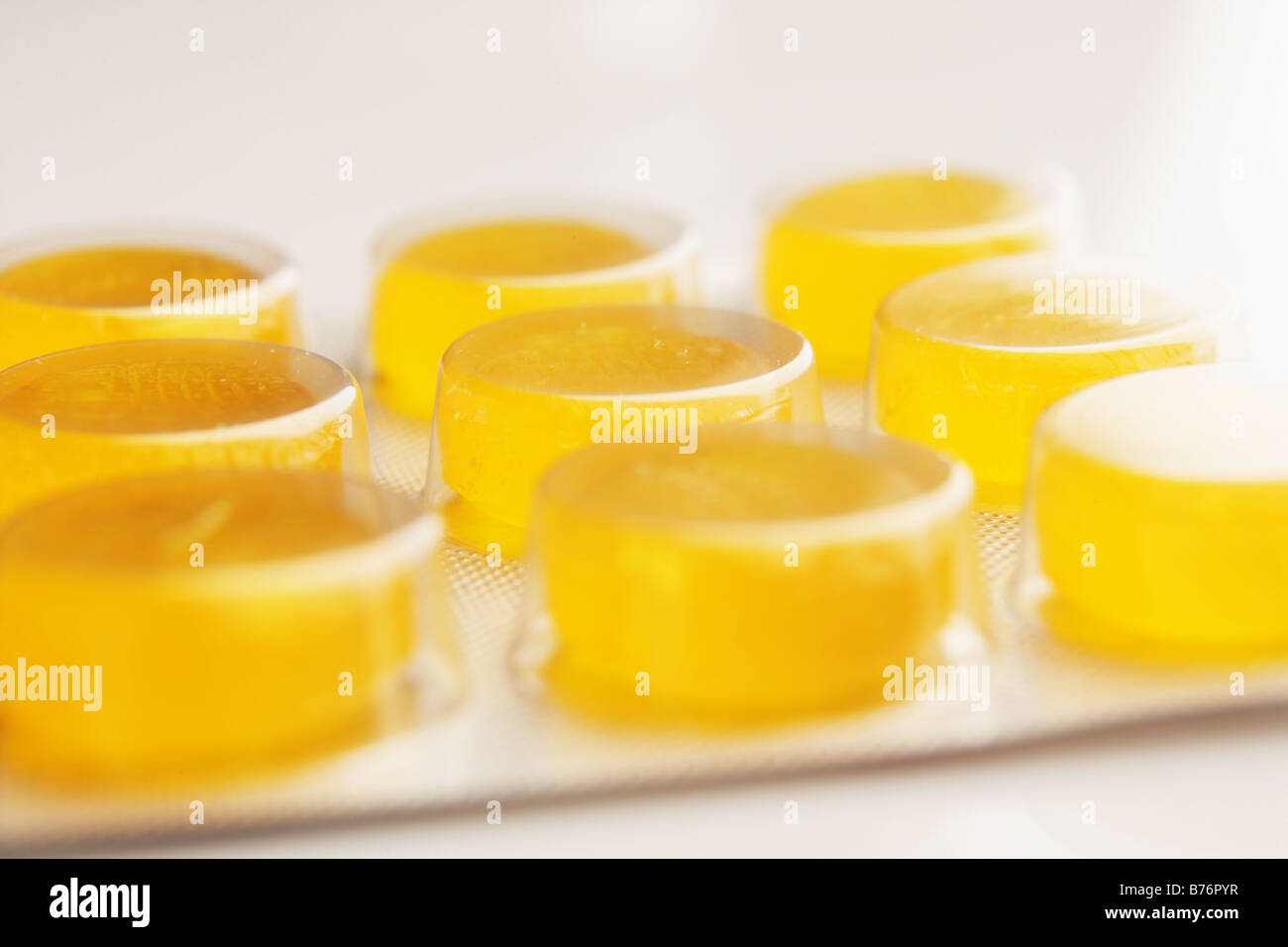 yellow tablets in plastic pack Stock Photo Alamy
