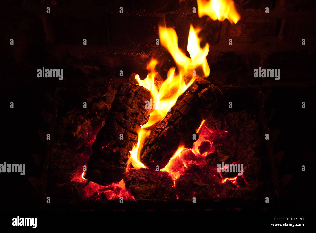 Domestic open log fire Stock Photo Alamy
