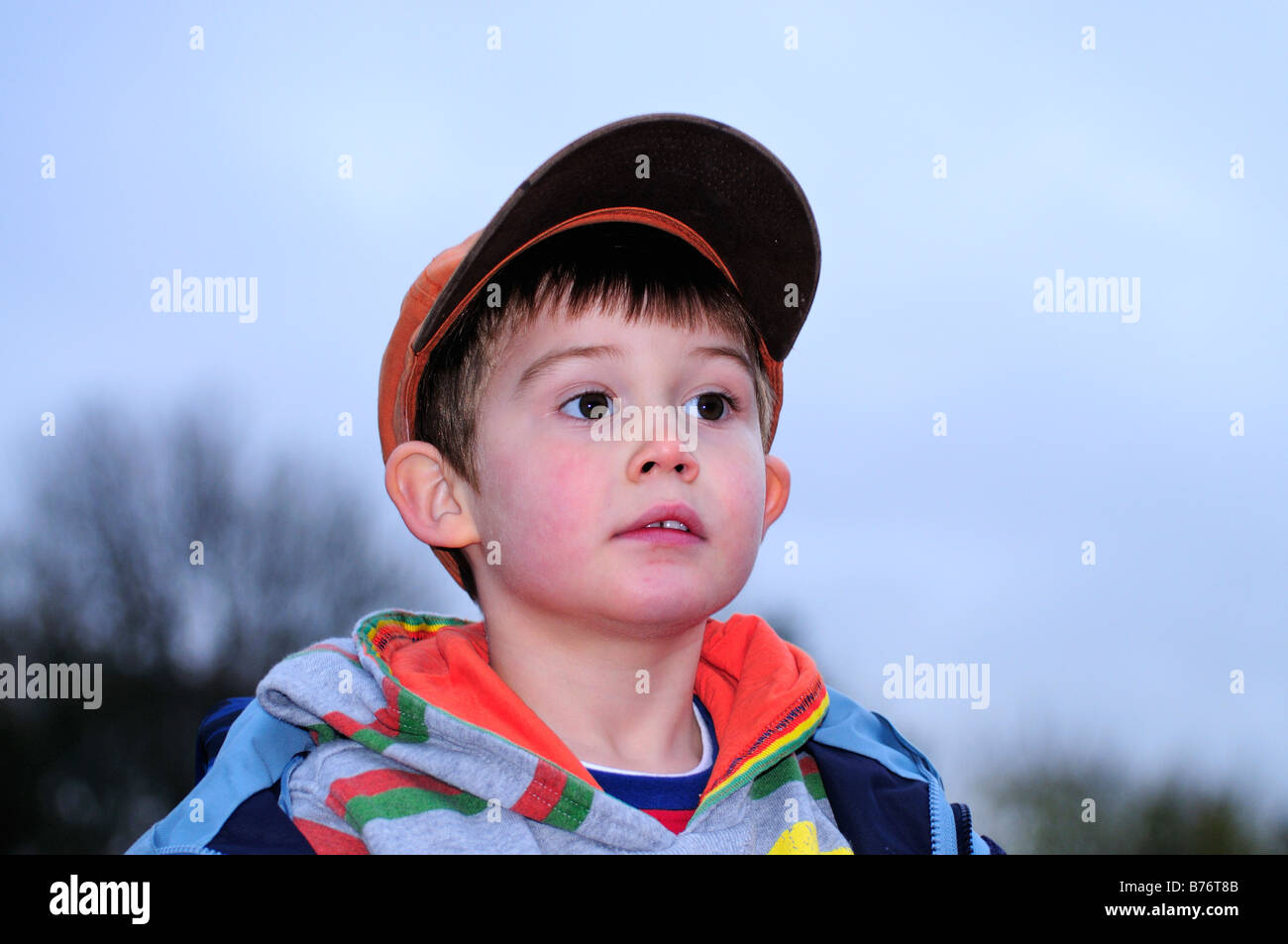 Boy wearing orange cap hi-res stock photography and images - Alamy