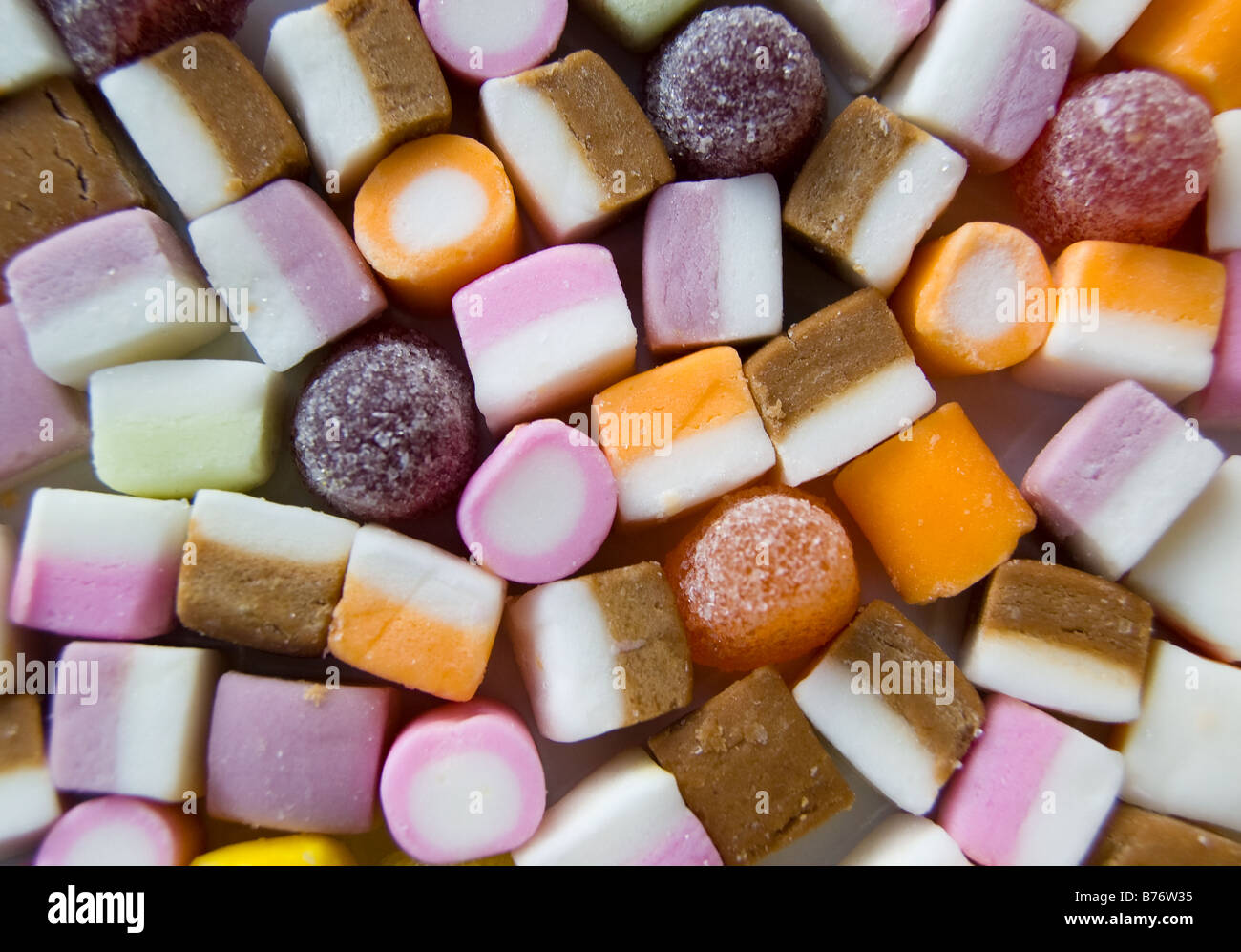 Brightly coloured dolly mixture sweets Stock Photo Alamy