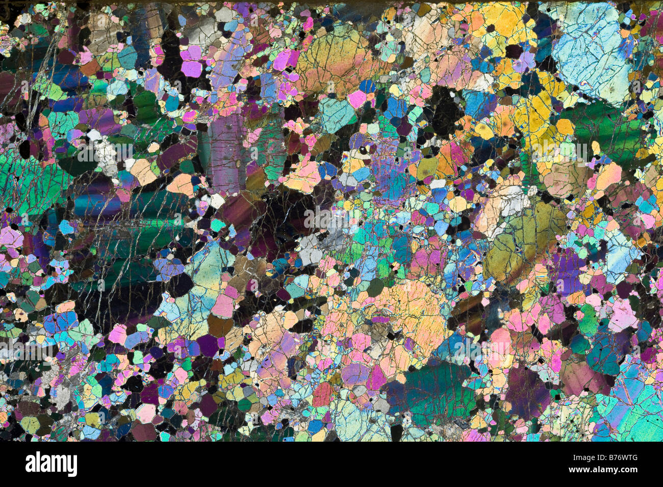 Mineralogy photomicrograph of Dunite, New Zealand. Cross polarized slide section Stock Photo