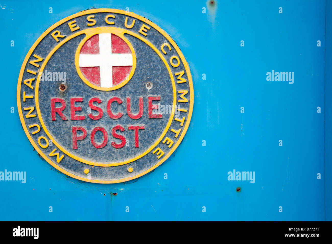 Mountain Rescue Committee badge on Coastguard building Swanage Dorset UK Stock Photo