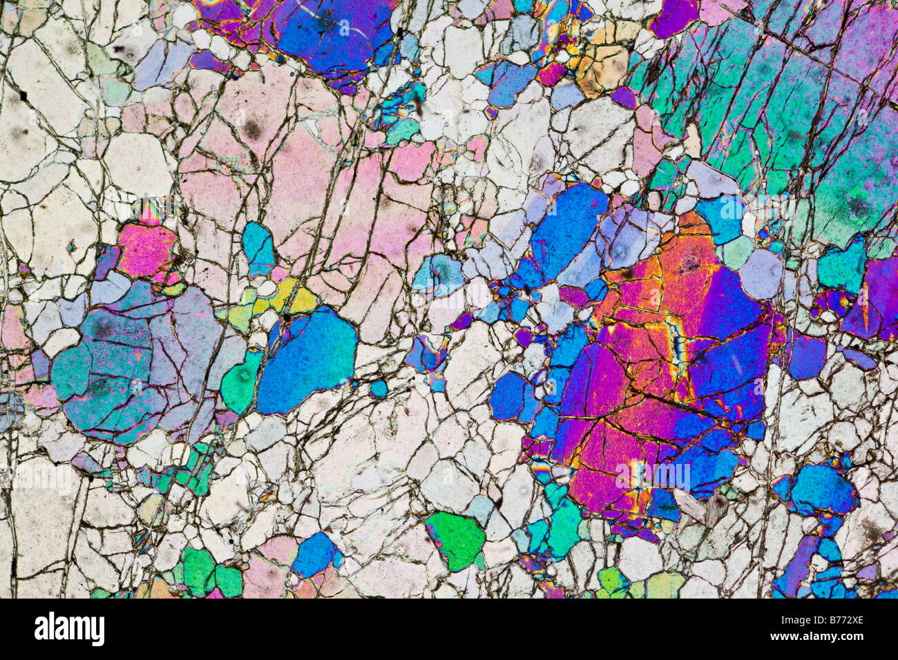 Mineralogy photomicrograph of Dunite, New Zealand. Cross polarized slide section Stock Photo
