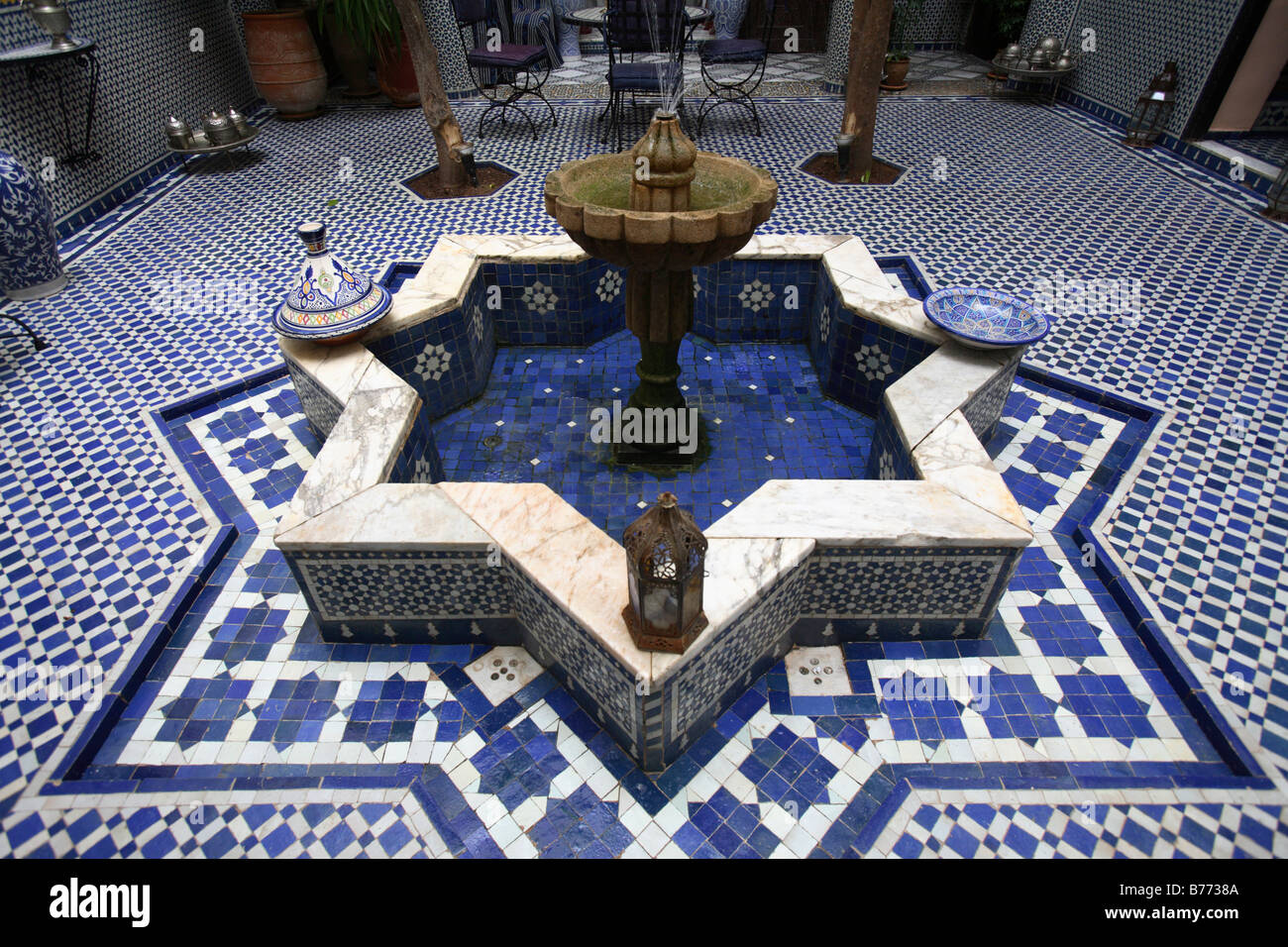 Fountain in a traditional Riad, Fes, Morocco Stock Photo - Alamy