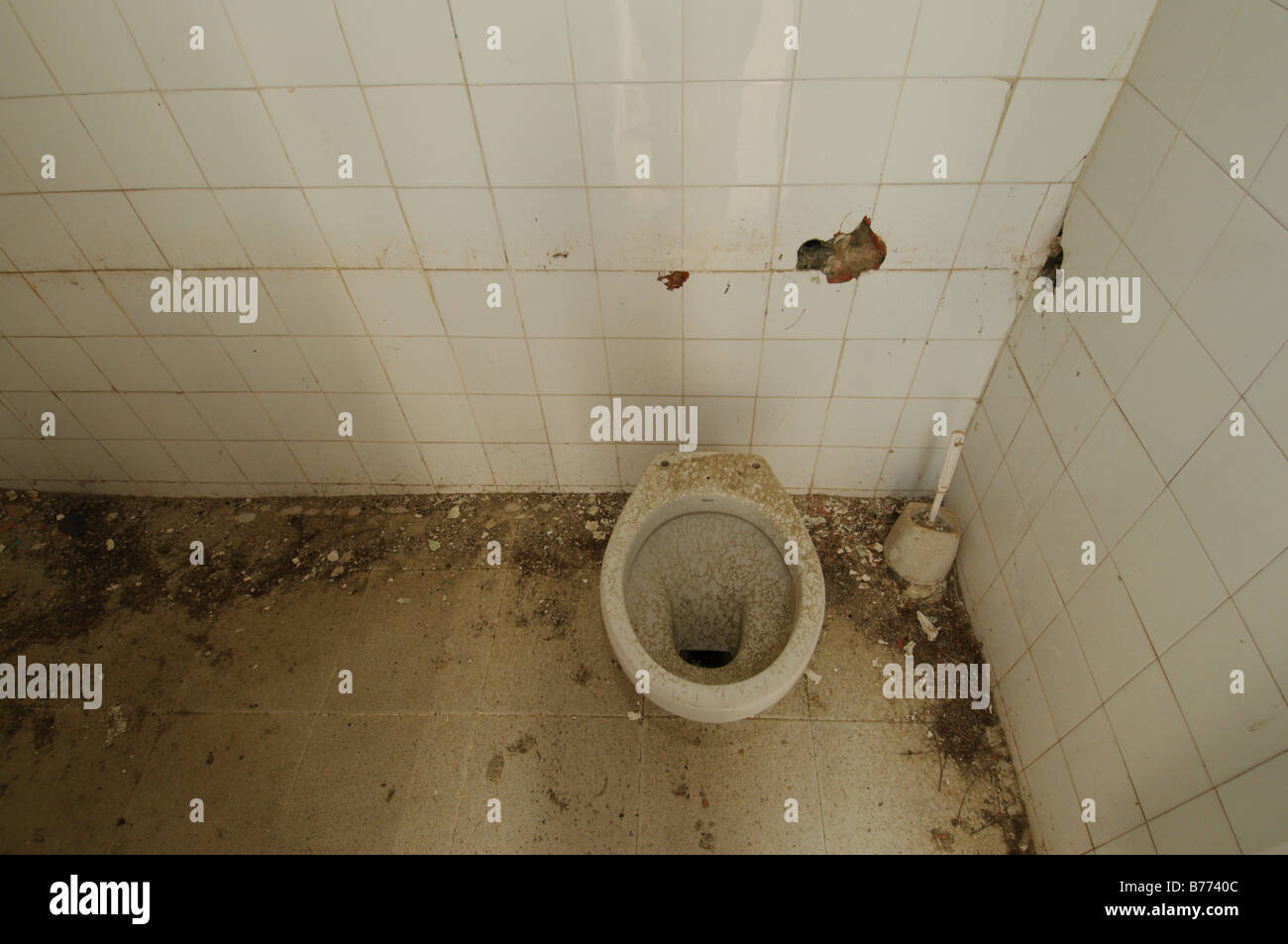 Abandoned vandalized lavatories at a former tourist camping facility Spain Stock Photo