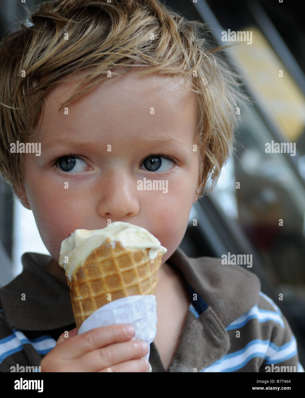 A boy eating ice cream. Stock Photo