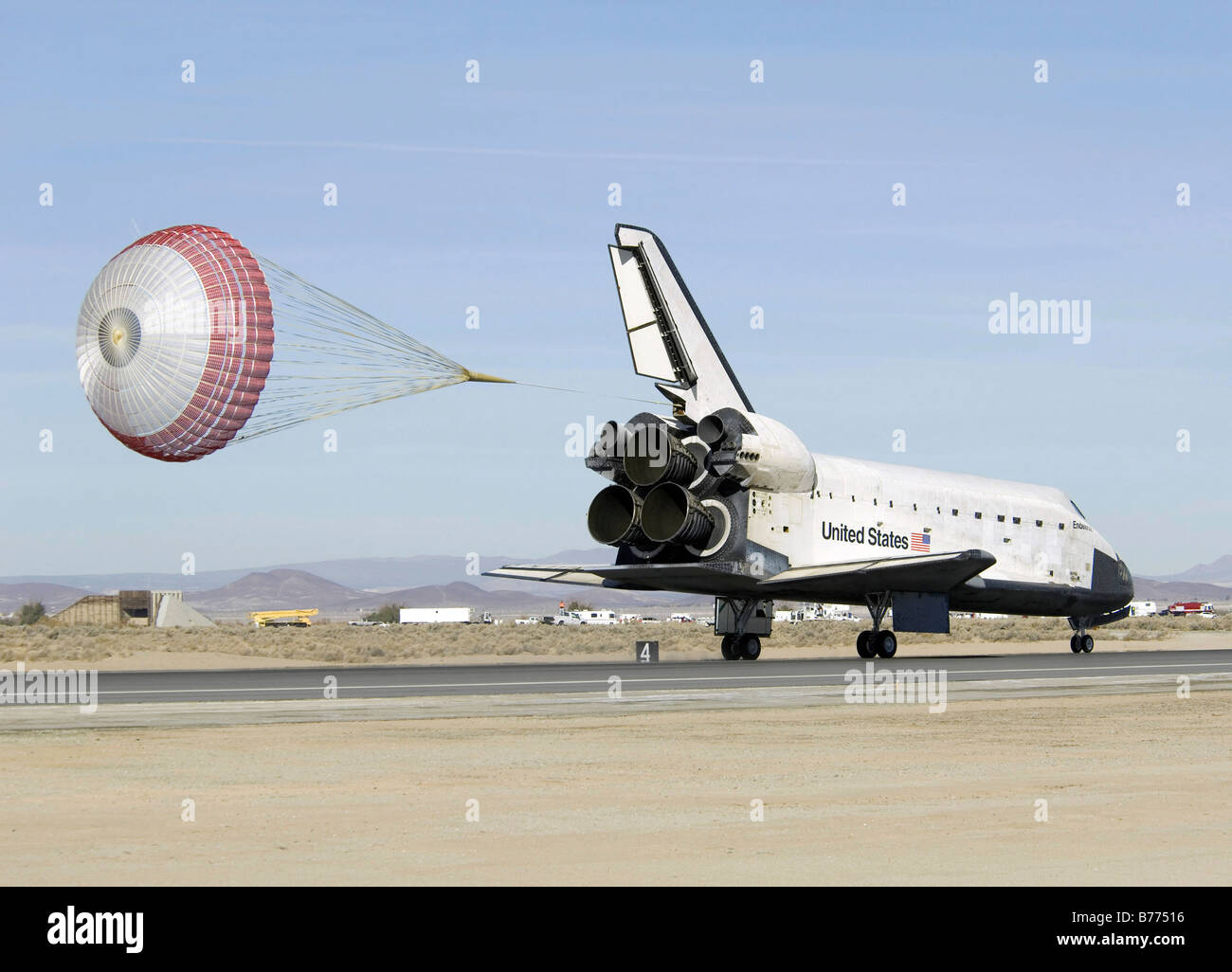 Space Shuttle Endeavour with its drag chute deployed. Stock Photo