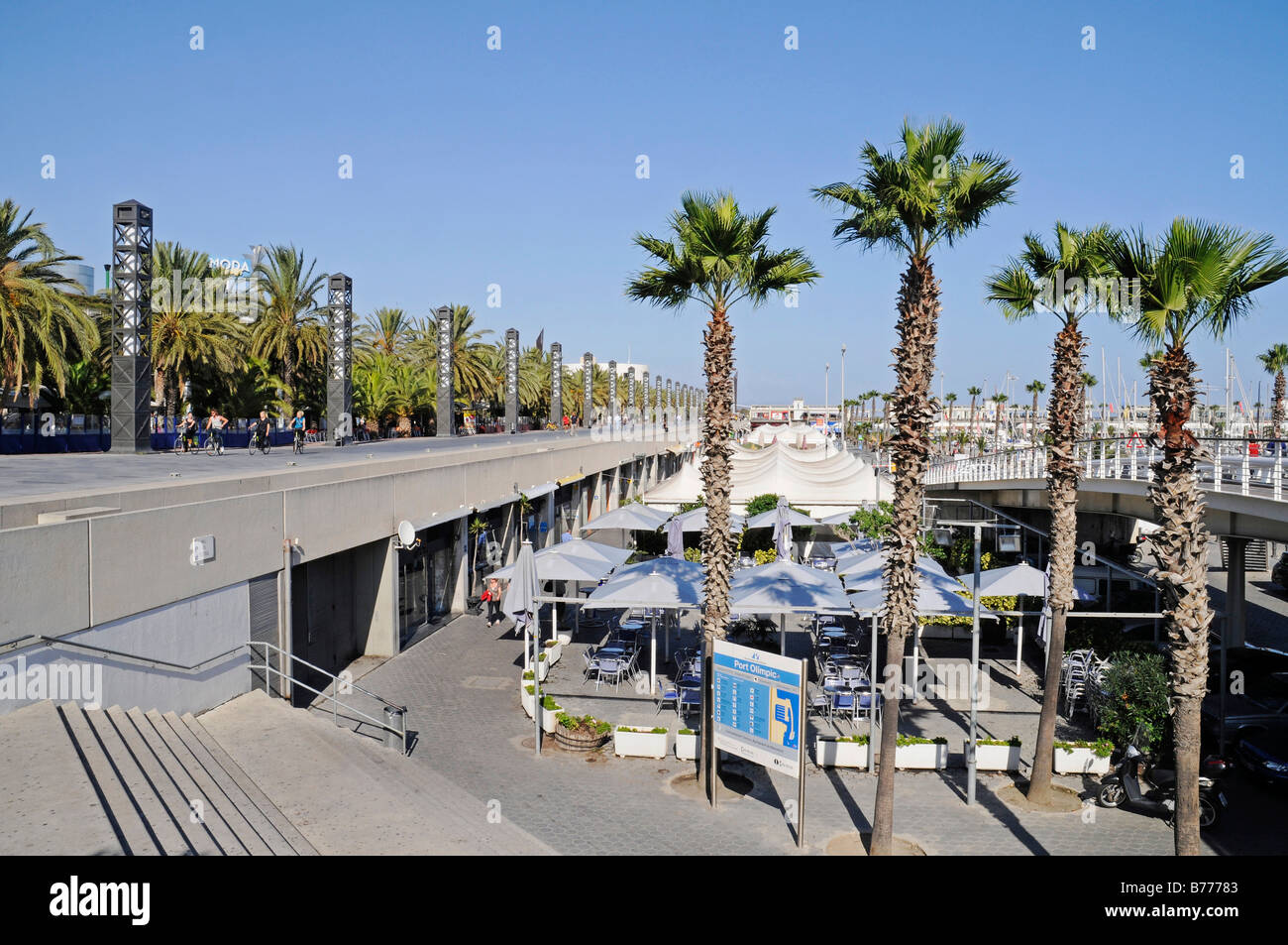 Promenade, restaurant and palm trees, Port Olimpic, Barcelona, Catalonia, Spain, Europe Stock Photo