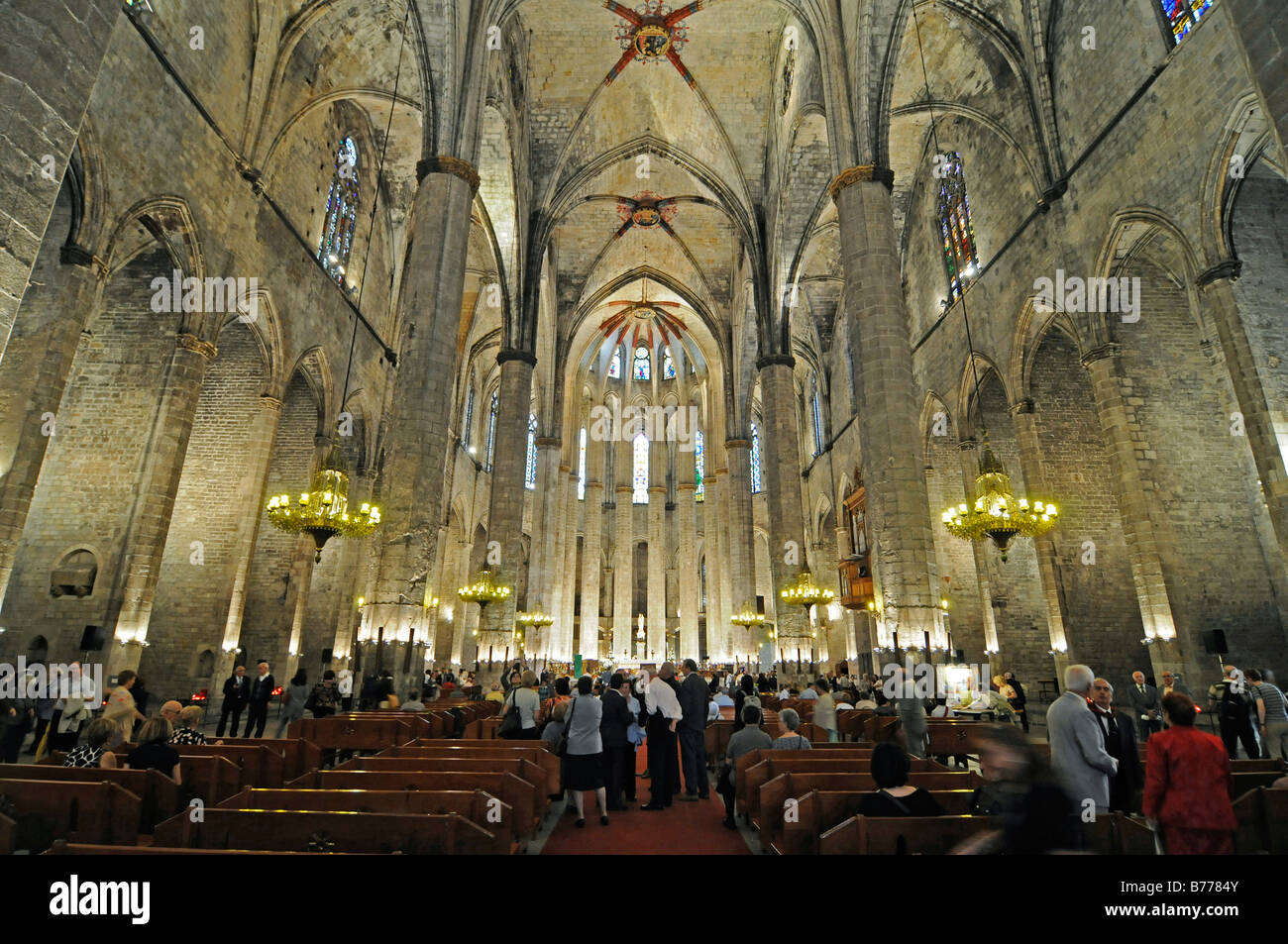 Congregation during a service in the Santa Maria del Mar church, ceiling vaults, Gothic, La Ribera quarter, Barcelona, Cataloni Stock Photo