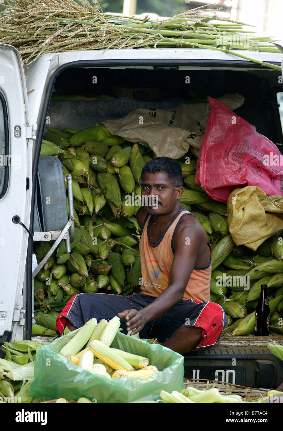 Delivery van full with corn, street hawker, Port Louis, Mauritius, Indian Ocean, Africa Stock Photo