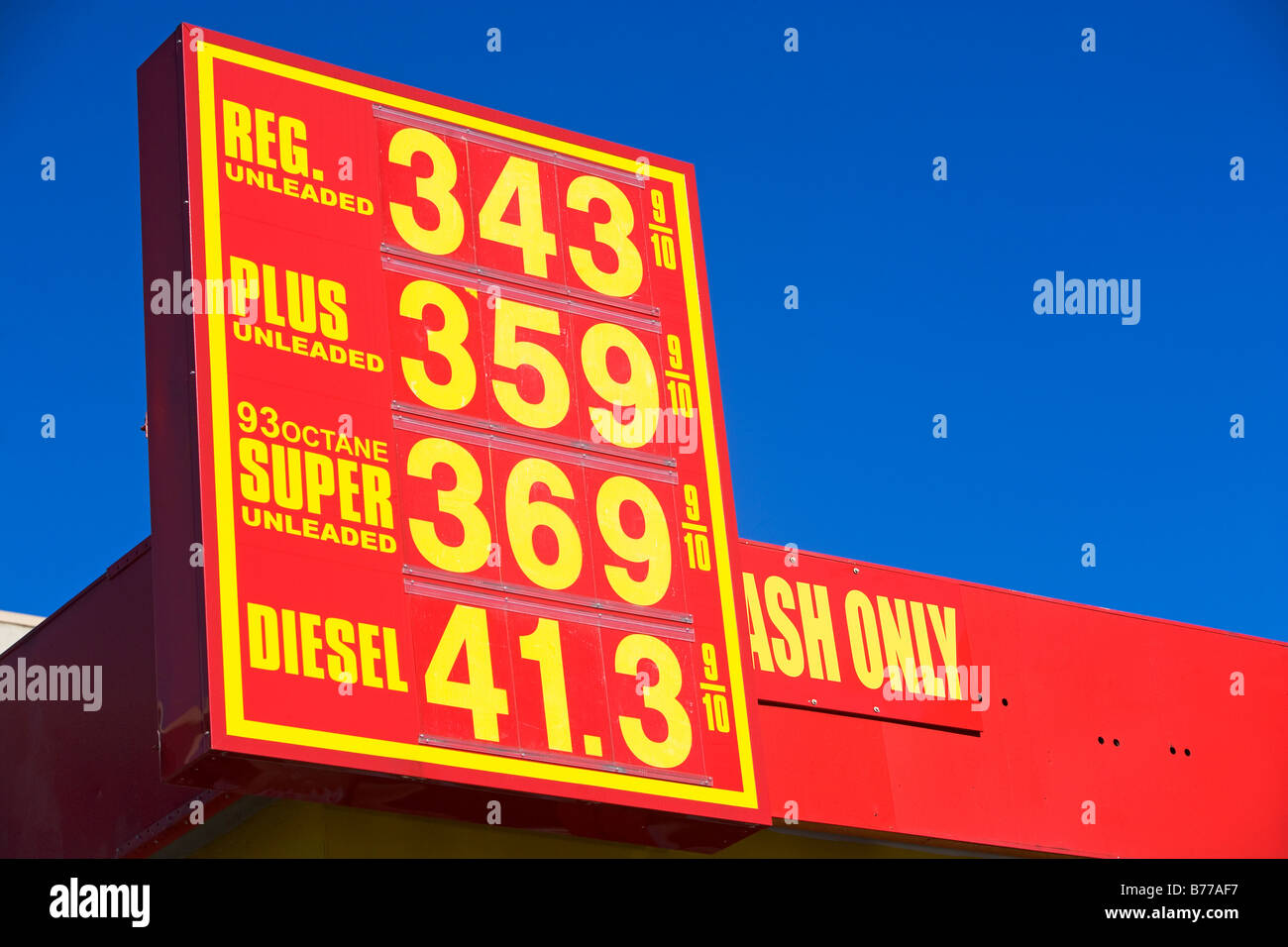 Gasoline prices advertised on gas station sign Stock Photo Alamy