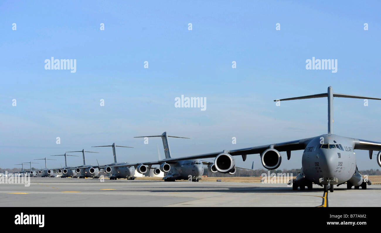 A Formation of U.S. Air Force C-17 Globemaster III's prepare for departure. Stock Photo