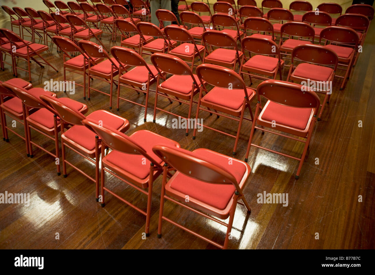 Fold up chairs rows Stock Photo - Alamy