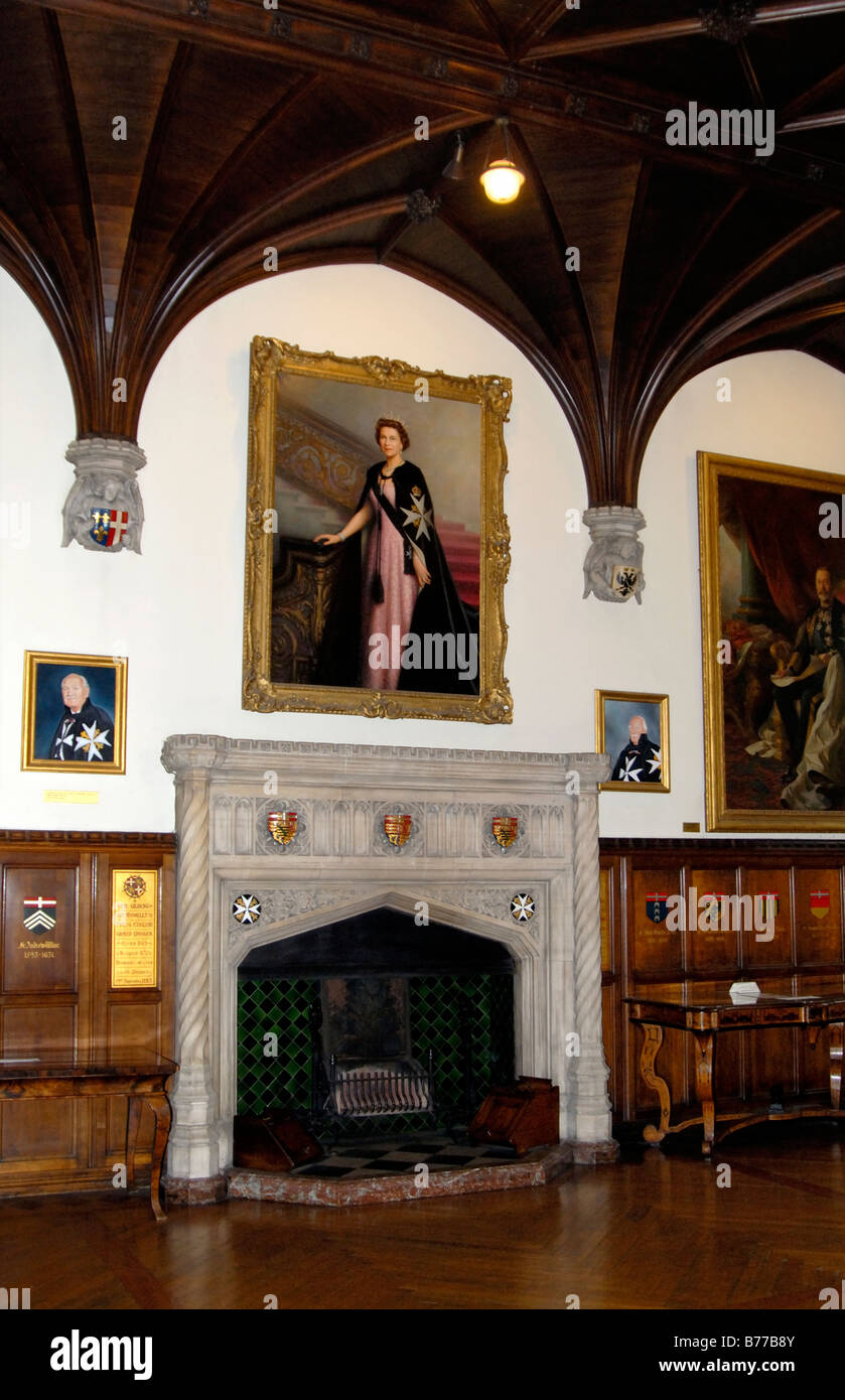 Painting Of Queen Elizabeth Ii Over Carved Stone Fireplace