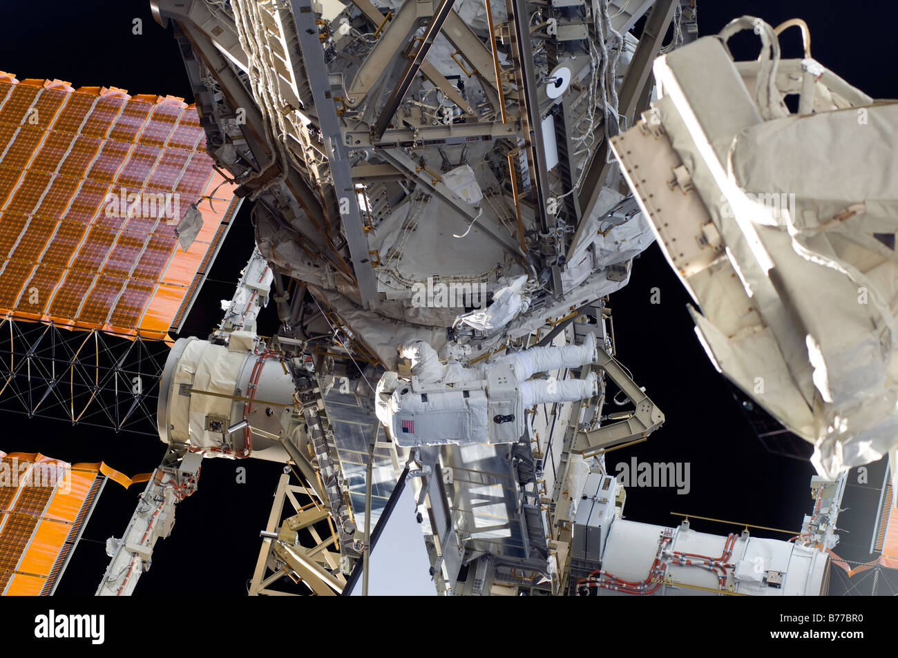 Astronaut participates in extravehicular activity. Stock Photo