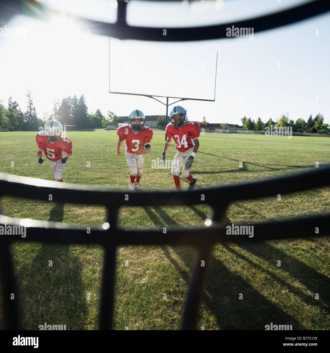 View of football players and field from inside helmet Stock Photo Alamy
