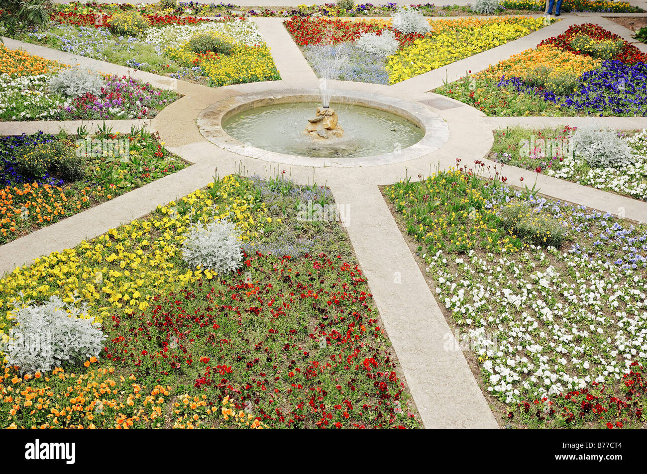 Gardens with fountain, Espace Van Gogh cultural centre, former hospital, Arles, Bouches-du-Rhone, Provence-Alpes-Cote d'Azur, S Stock Photo