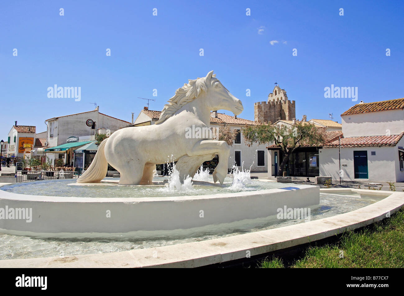 Statue of Camargue Horse and fountain, Les Saintes-Maries-de-la-Mer, Camargue, Bouches-du-Rhone, Provence-Alpes-Cote d'Azur, So Stock Photo