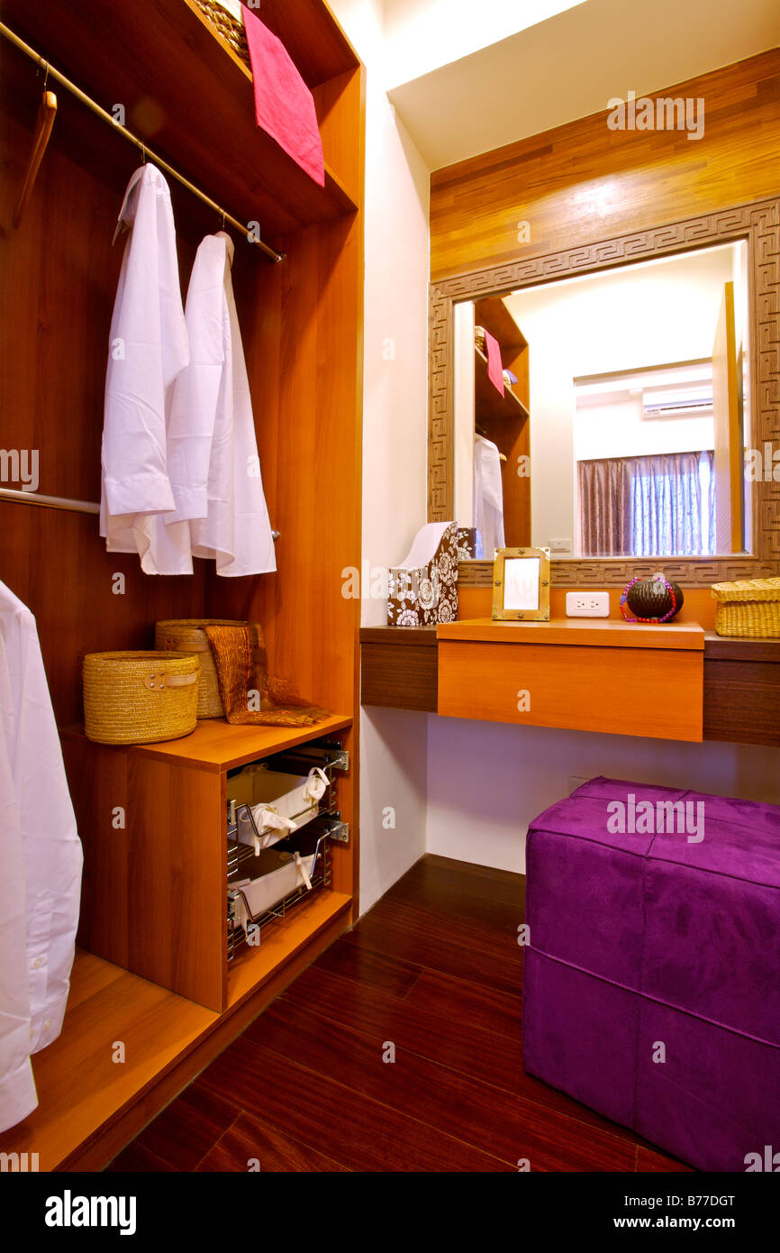 Interiors of a walk in wardrobe and dressing table Stock Photo Alamy