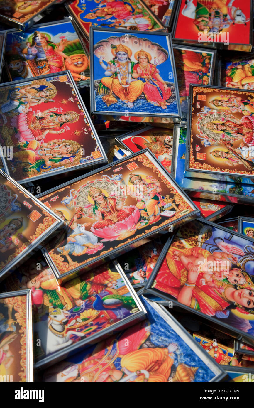 Pictures of Ganesh, Parvati and Shiva for sale in a street market in India Stock Photo