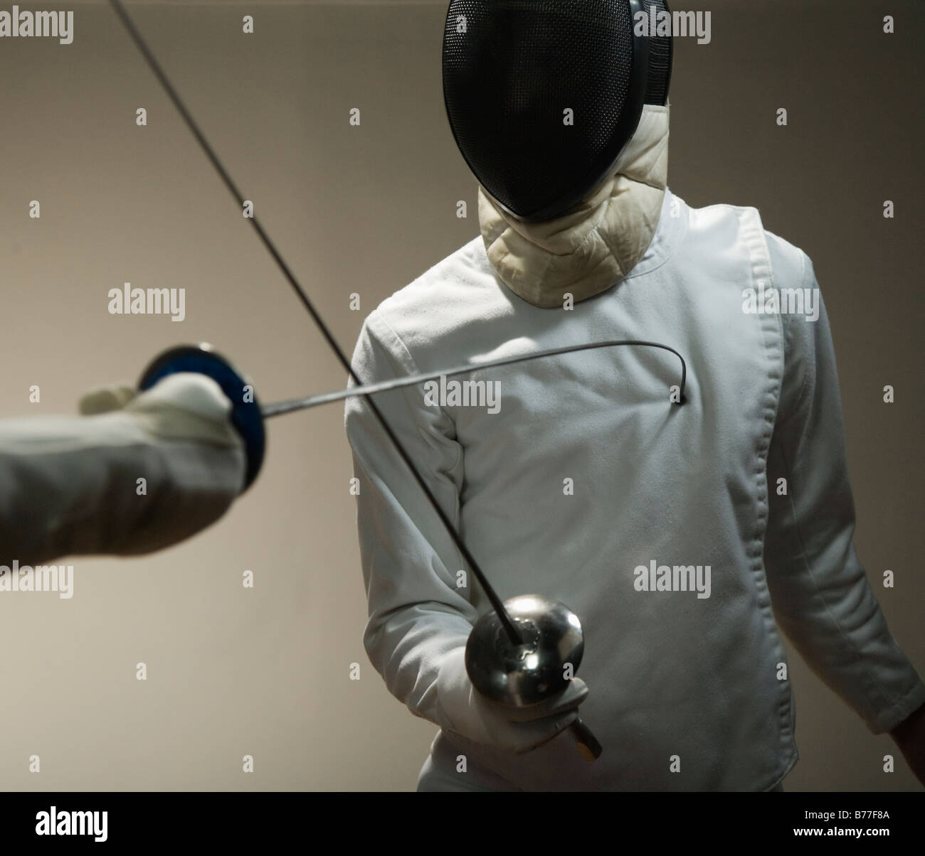 Two men fencing Stock Photo Alamy