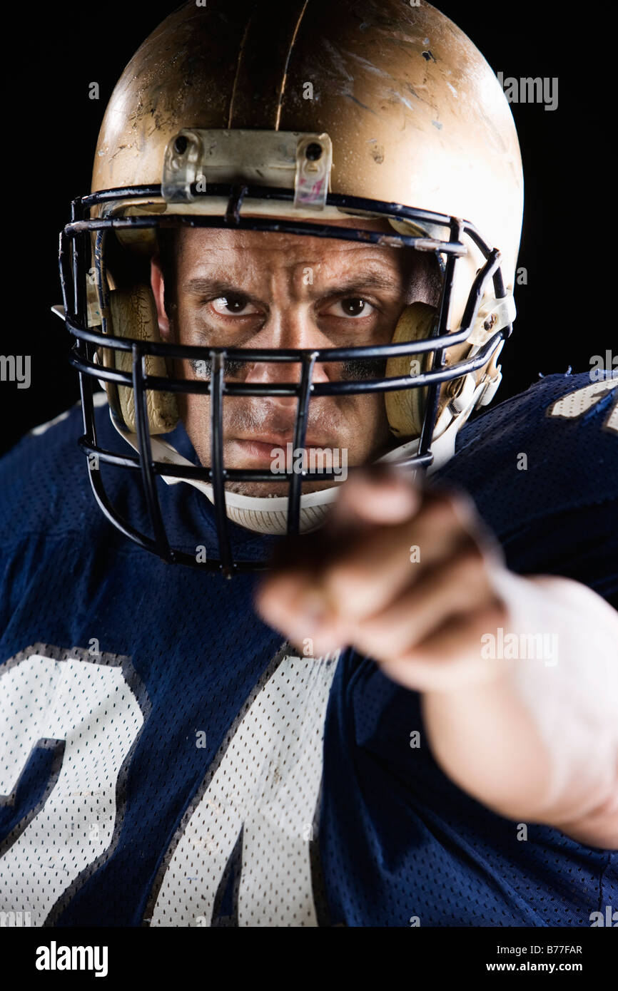 Football player pointing and looking intense Stock Photo Alamy