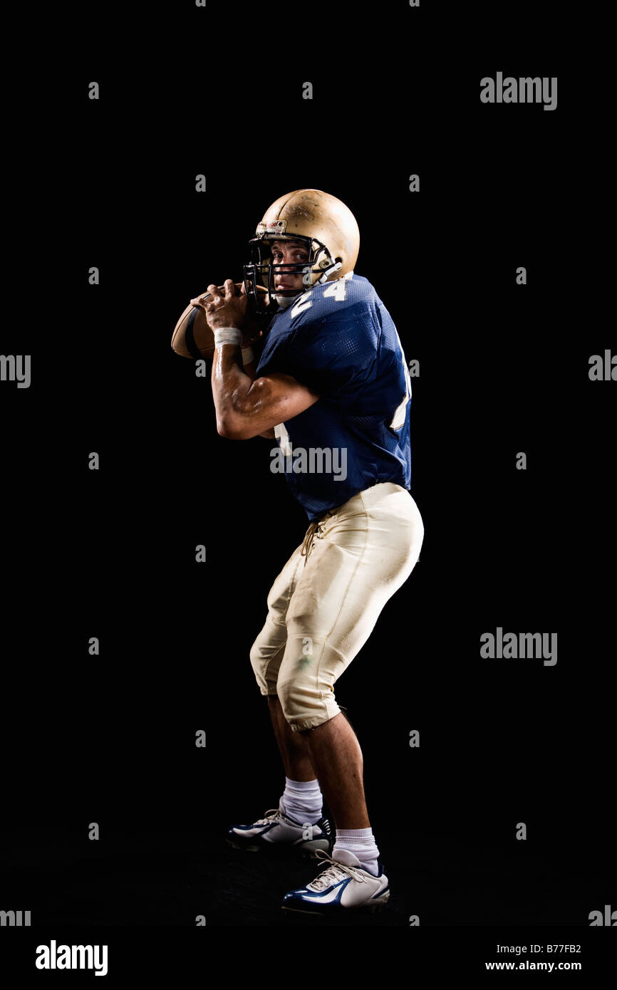 Quarterback preparing to throw football Stock Photo Alamy