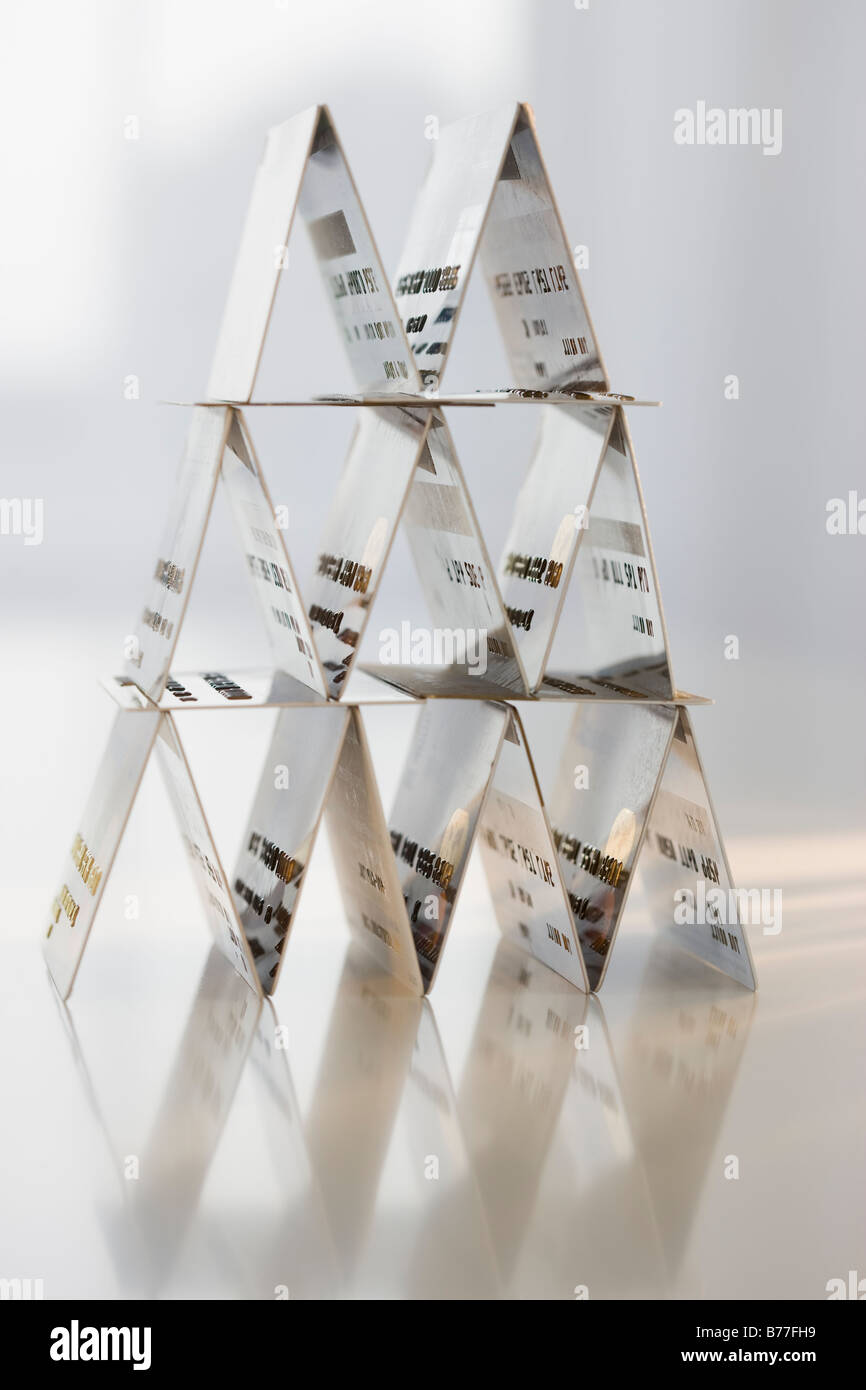 Card Formed Card-house formed credit cards Stock Photo - Alamy