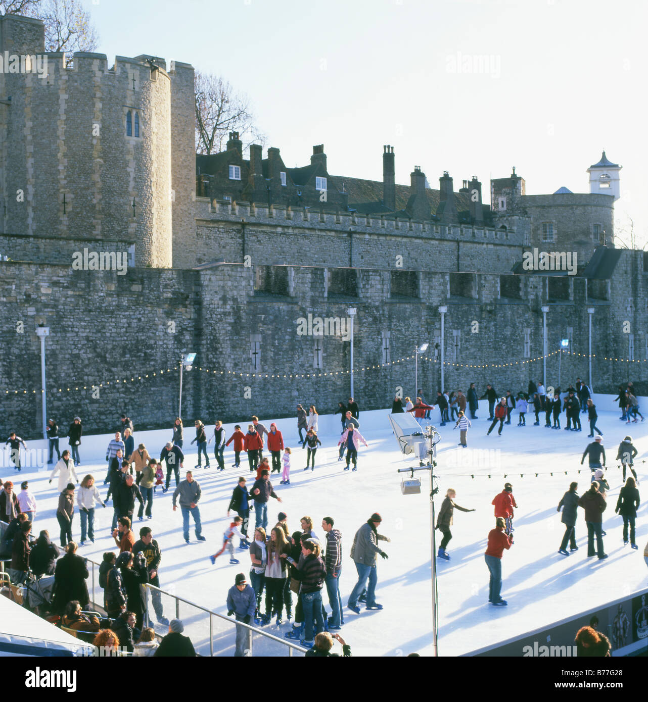 People Ice skating on the urban rink at the White Tower, Tower of