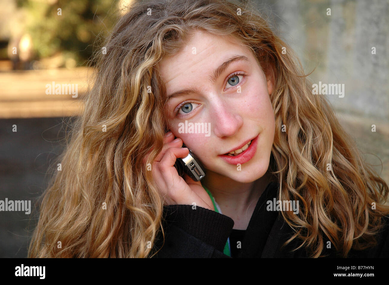 close up portrait of girl on mobile phone Stock Photo