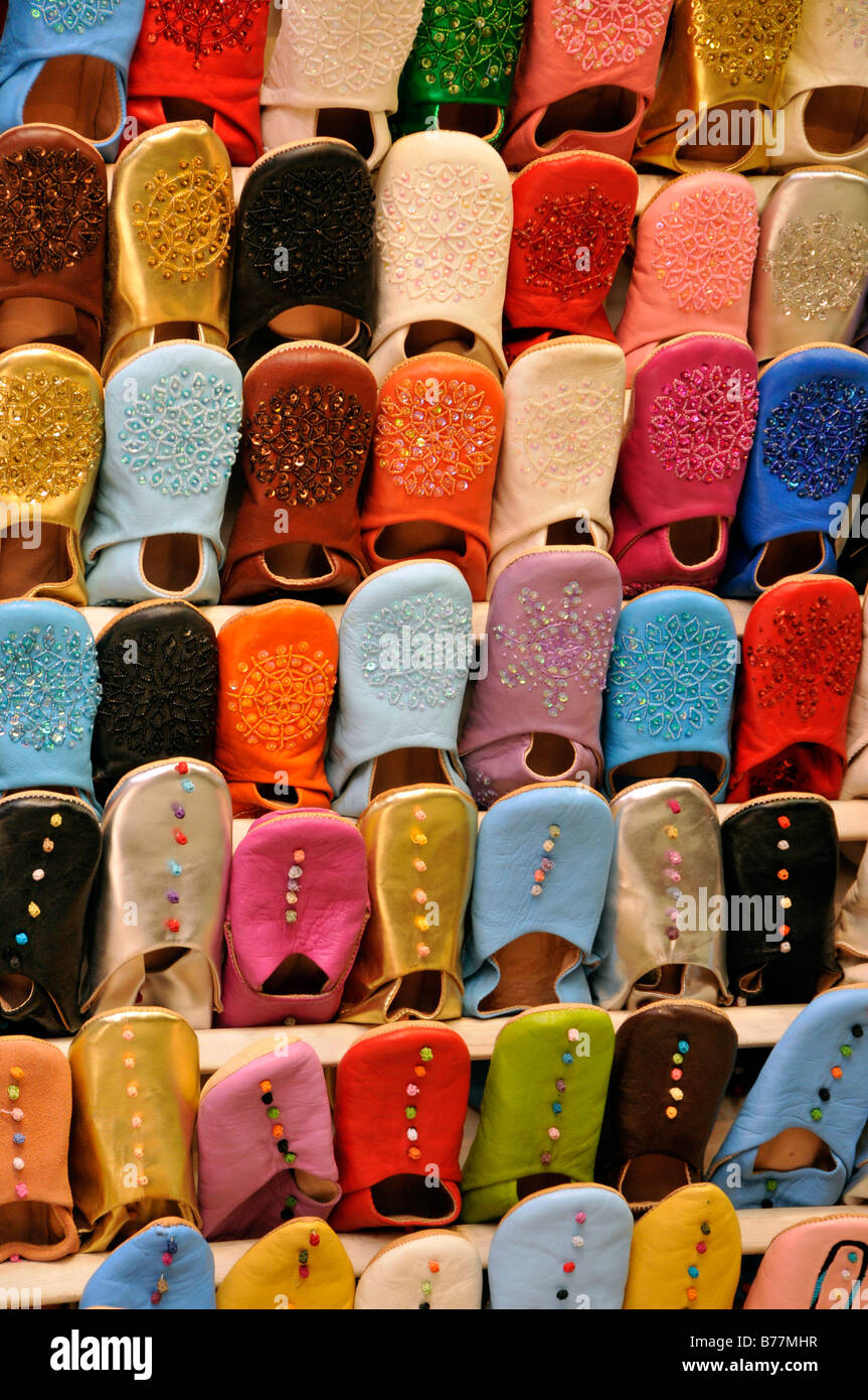 Typical Moroccan leather slippers in a shoe shop at the souk, market, in the medina quarter of Marrakesh, Morocco, Africa Stock Photo