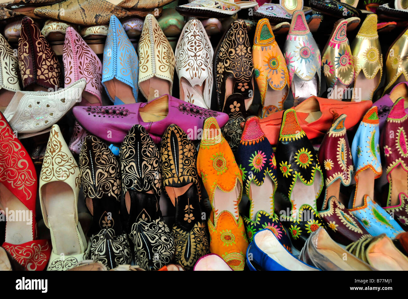 Typical Moroccan leather slippers in a shoe shop at the souk, market, in the medina quarter of Marrakesh, Morocco, Africa Stock Photo