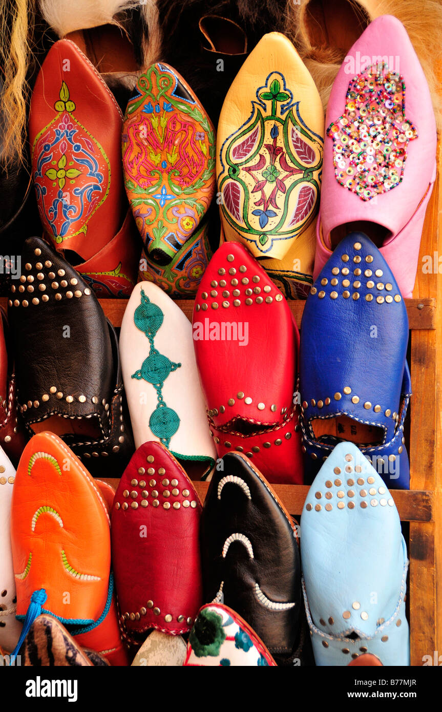 Typical Moroccan leather slippers in a shoe shop in the souk, market, in the Medina, historic town centre, Marrakech, Morocco,  Stock Photo