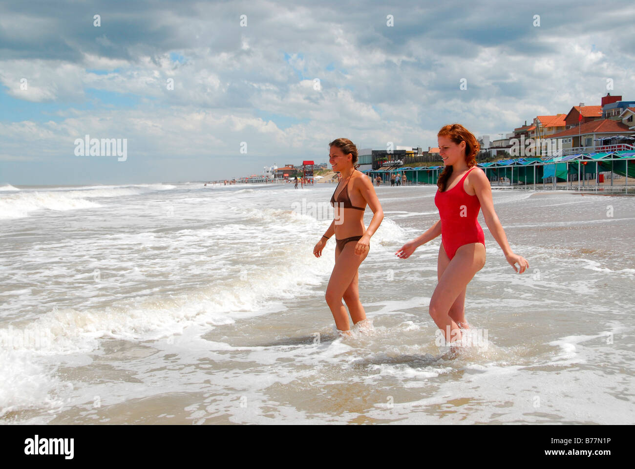 Two young Argentinian women at the beach of Pinamar, Buenos Aires Province, Argentina, South America Stock Photo