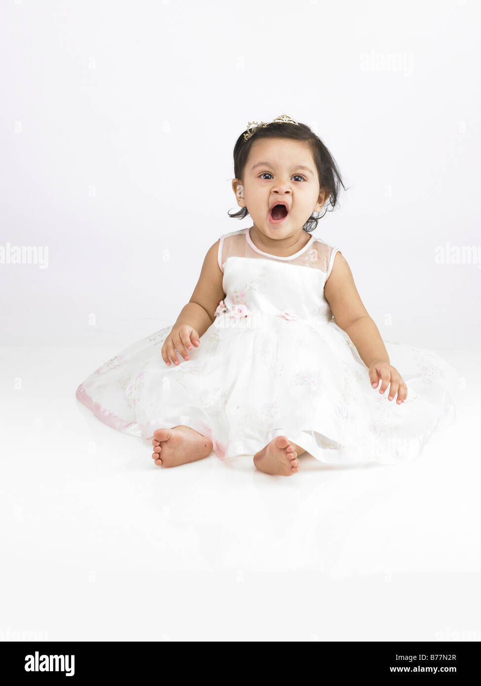 baby girl with white dress