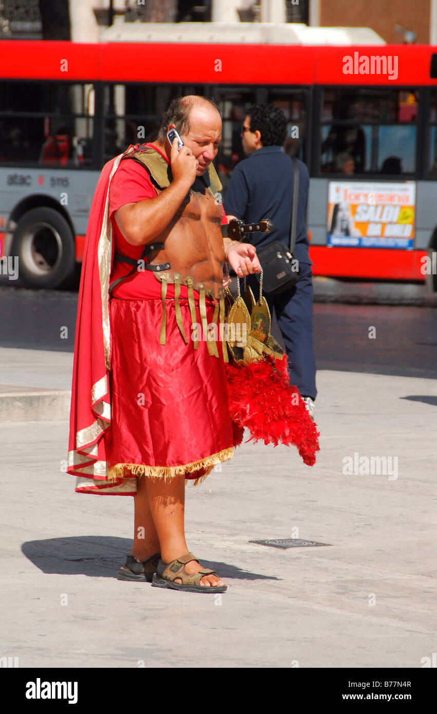 Roman in masquerade on his mobile phone, Rome, Italy, Europe Stock Photo