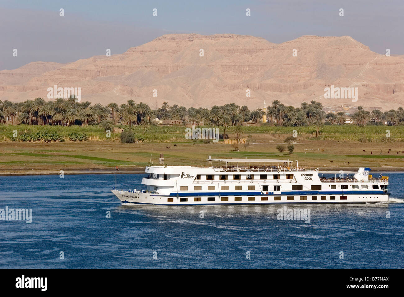 View of West Thebes over the Nile with cruise ship, Luxor, Egypt, Africa Stock Photo