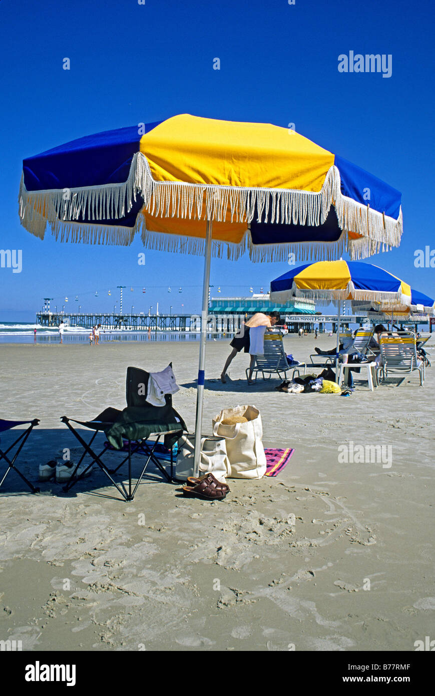 People beach umbrellas Daytona Beach Florida Stock Photo