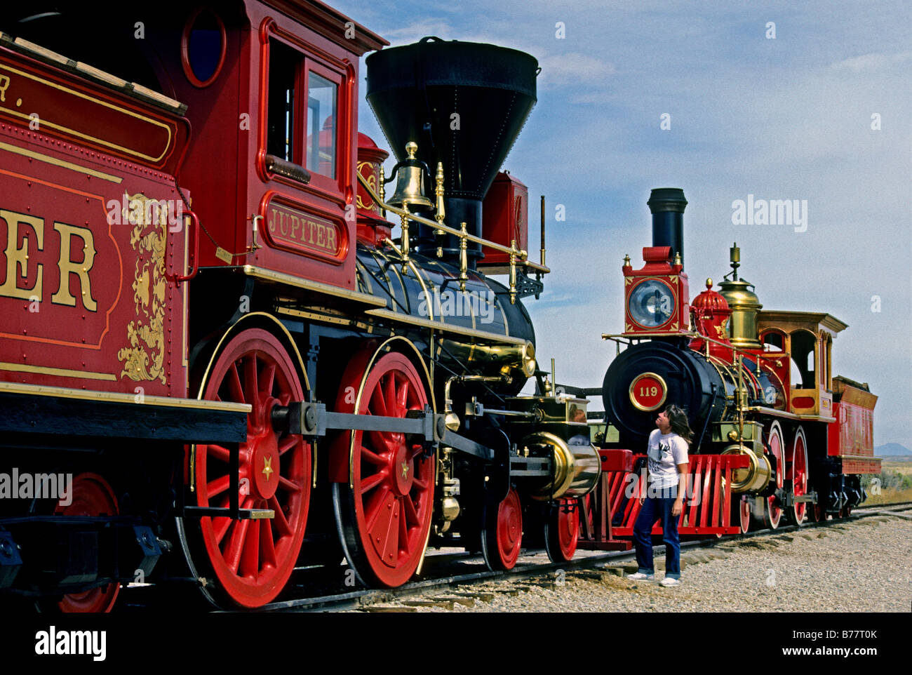 Released,woman at steam locomotives,Golden Spike National Historic Site,Promontory Utah Stock Photo