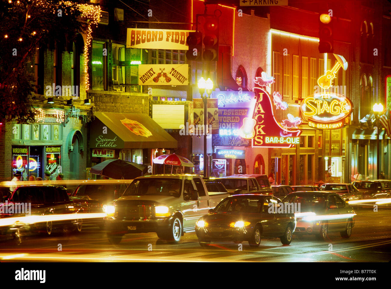 Night lighting traffic along Broadway music district downtown Nashville