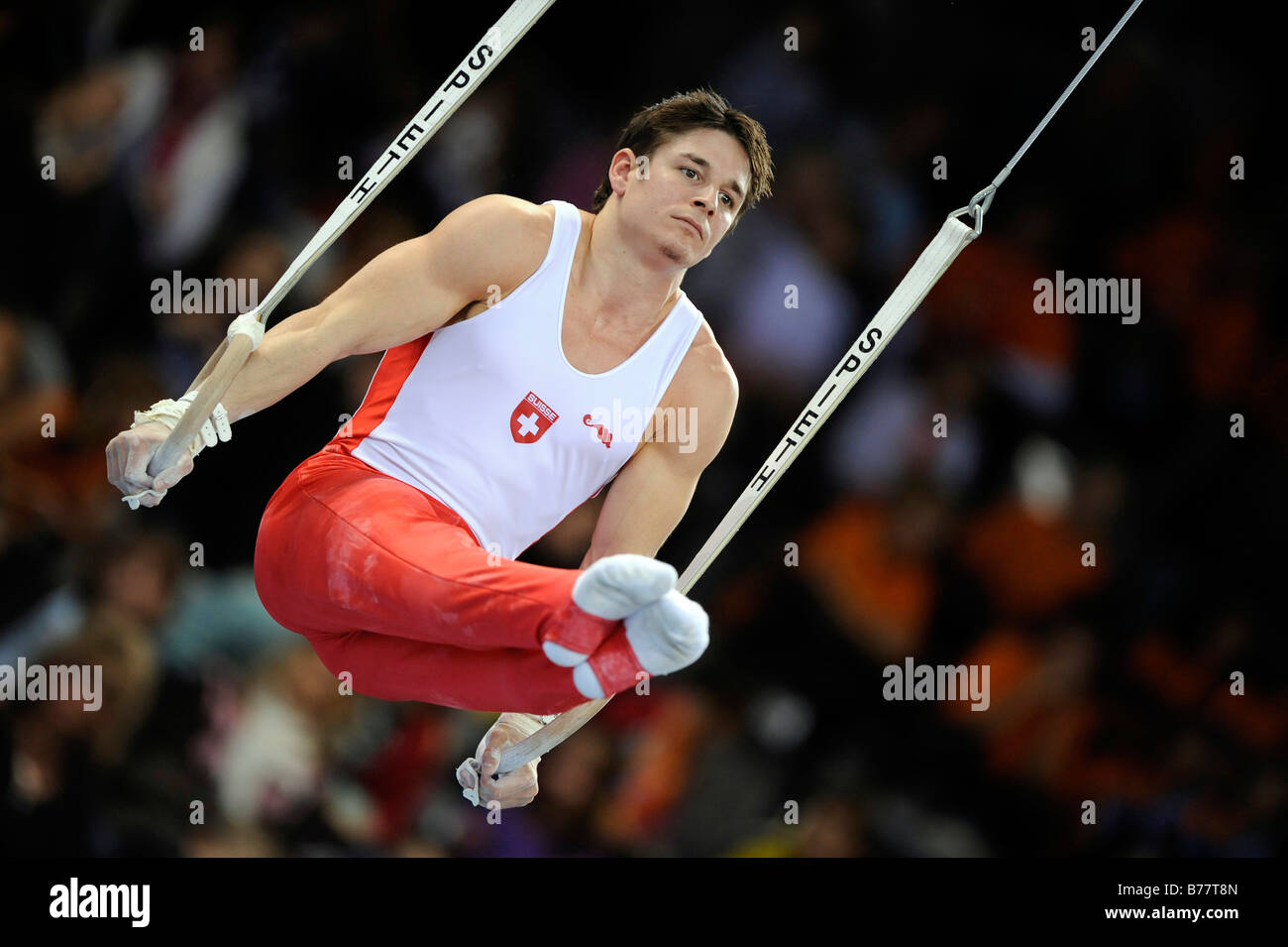 Nicolas Boeschenstein, Switzerland, performing an L-sit on the rings, Gymnastics World Cup Stuttgart 2008, Baden-Wuerttemberg,  Stock Photo