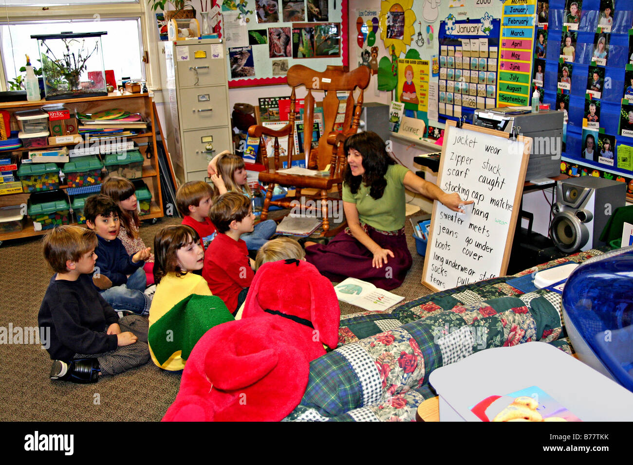 First grade teacher teaching vocabulary words to elementary school class California Stock Photo
