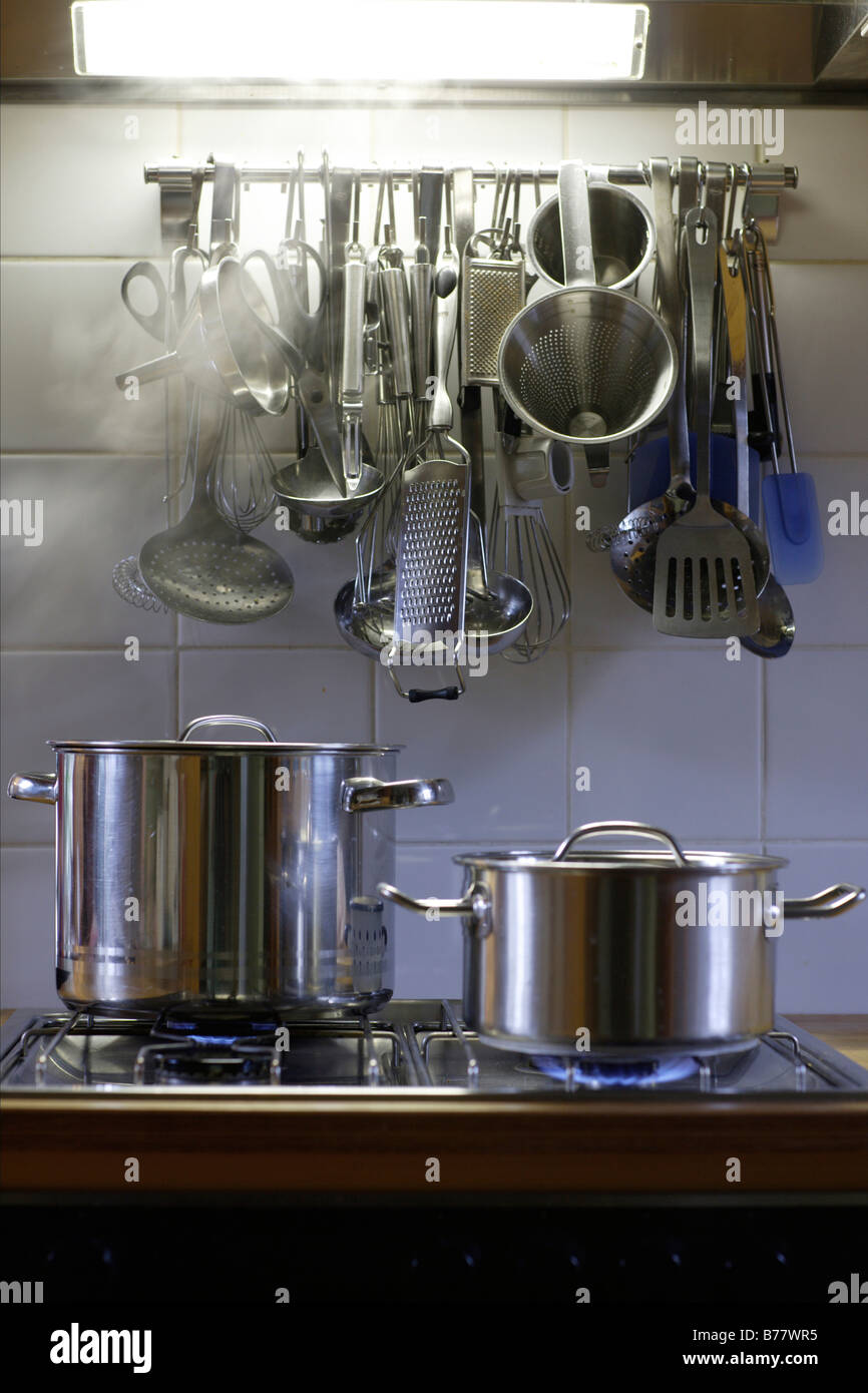 Pots on a gas stove Stock Photo Alamy