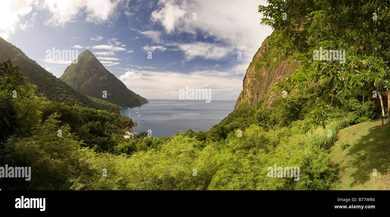 The Pitons in St Lucia and the Jalousie Hotel in the distance Stock Photo