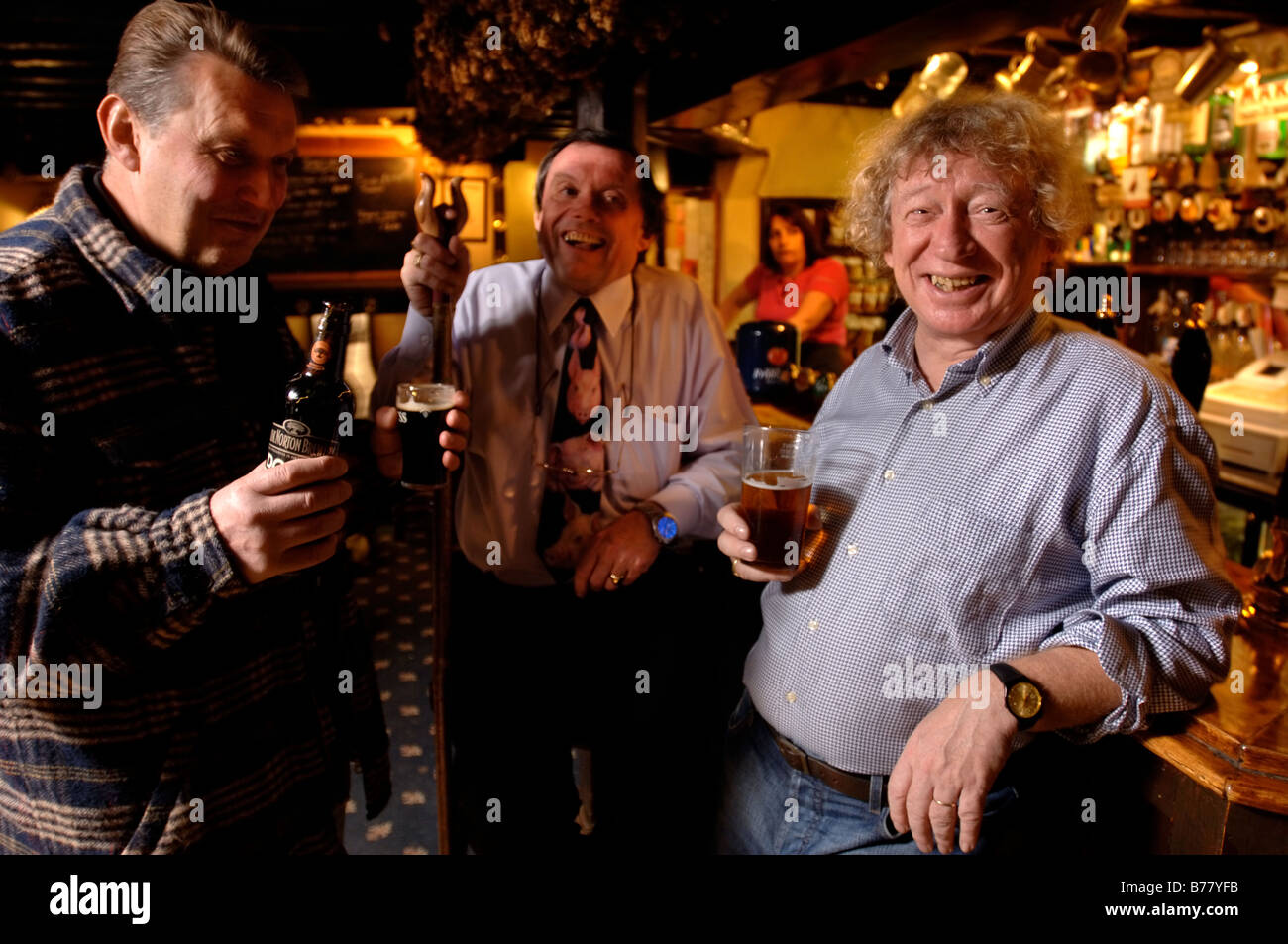 PATRONS OF A TRADITIONAL BRITISH PUB DRINKING BEER UK Stock Photo Alamy