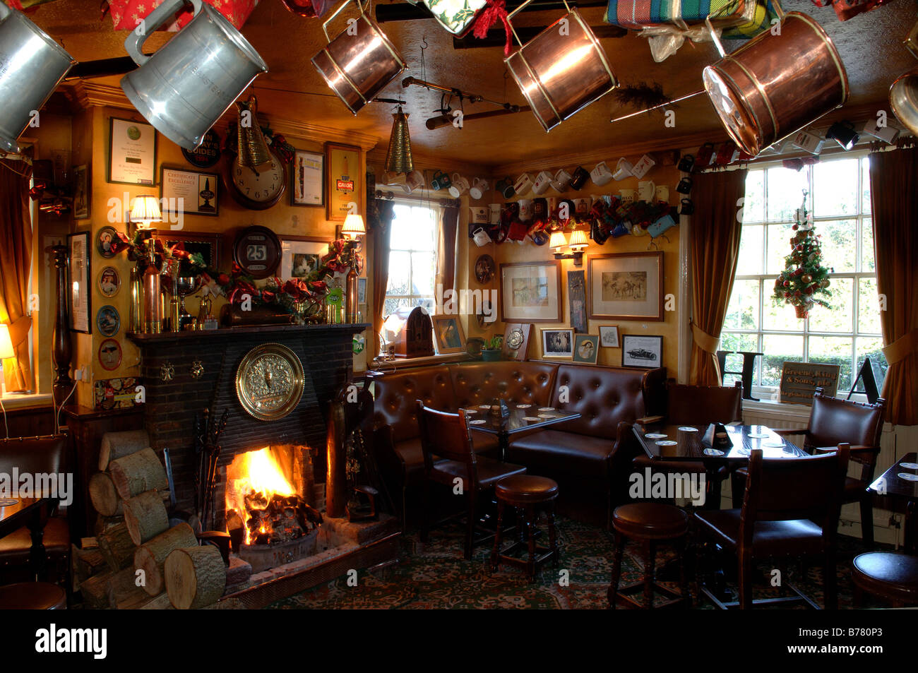 open fire in a traditional english country pub Stock Photo Alamy